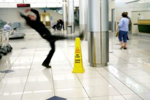A person who is slipping on a wet floor in New Jersey.