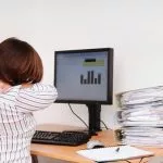Business Woman with Neck Pain