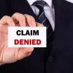 Man-Holding-A-Card-With-Claim-Denied-Words_600x400-min GT