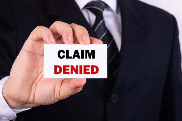 Man-Holding-A-Card-With-Claim-Denied-Words_600x400-min GT