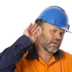 Construction Worker with Hearing Loss Trying to Listen