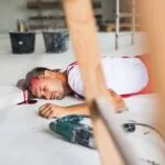 unconscious-man-worker-lying-on-the-floor-after-a-head-injury