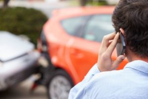 A victim of car accident calling his attorney in New Jersey.