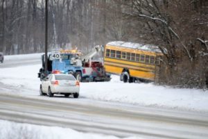 Auto and bus crash on the side of a highway in New Jersey.