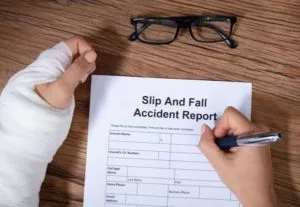 Injured person fills out slip and fall claim form