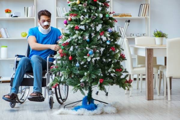 Injured man celebrating Christmas at home.